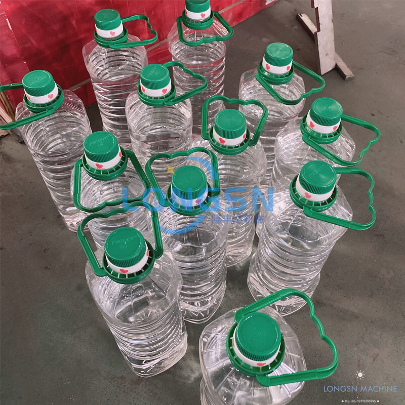Bon prix automatique mis sur une manche de bouteille de 5 litres Machine de bouteille pour animaux de compagnie Machine d'applicateurs